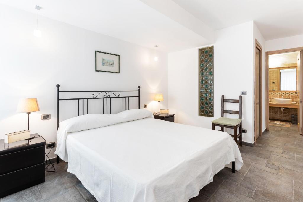 Łóżko lub łóżka w pokoju w obiekcie Penelope Seaview Apartment