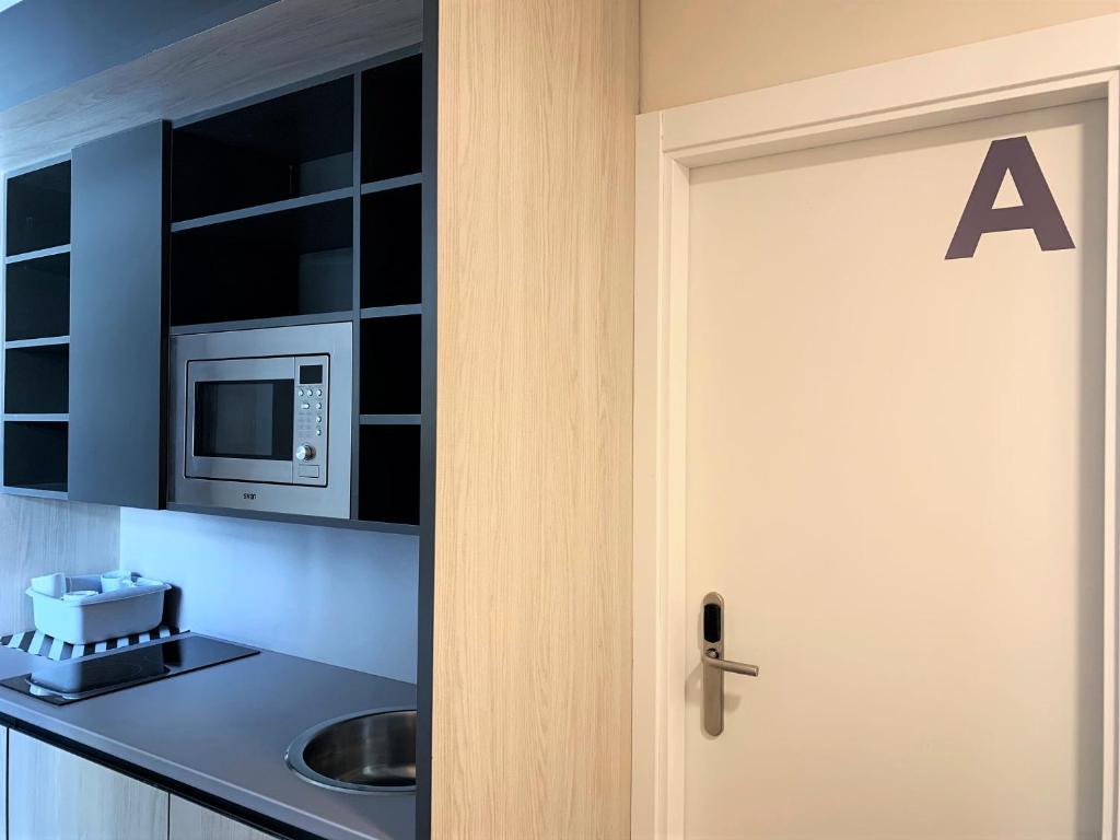 A kitchen or kitchenette at Residencia Universitaria Resa Campus Málaga