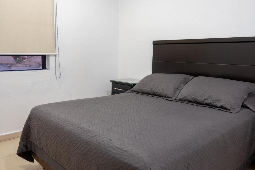 Postel nebo postele na pokoji v ubytování Apartamentos Torre II Condominios - Pet Friendly