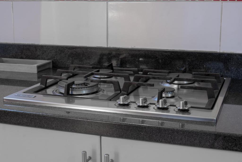 Kuchyň nebo kuchyňský kout v ubytování Apartamentos Torre II Condominios - Pet Friendly