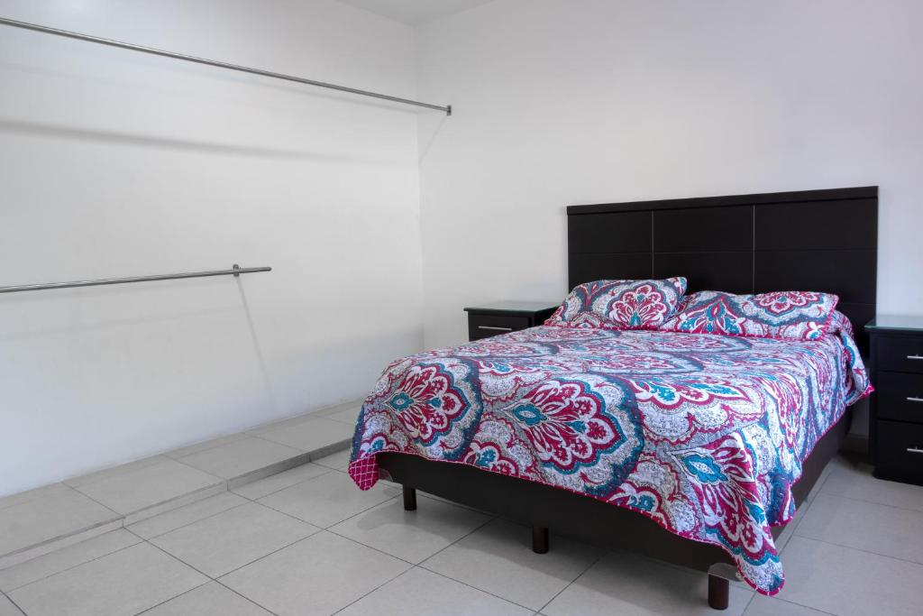 Postel nebo postele na pokoji v ubytování Apartamentos Torre II Condominios - Pet Friendly