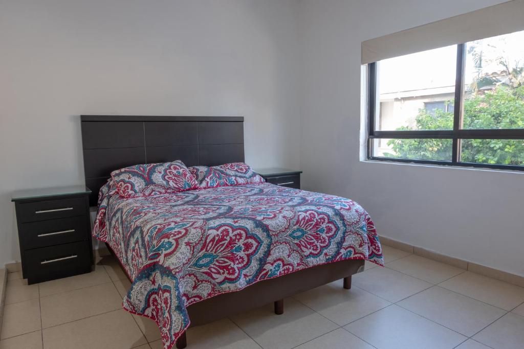 Postel nebo postele na pokoji v ubytování Apartamentos Torre II Condominios - Pet Friendly