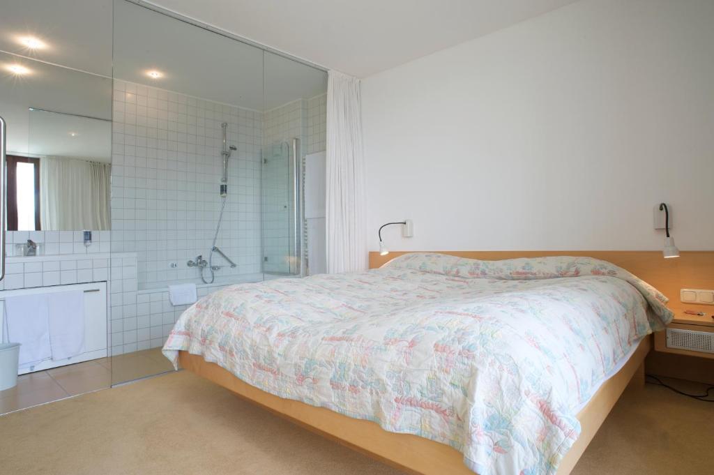 Postel nebo postele na pokoji v ubytování Hotel Seegasthof Oberndorfer