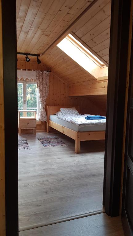 Postel nebo postele na pokoji v ubytování Gästehaus Alpenglühn