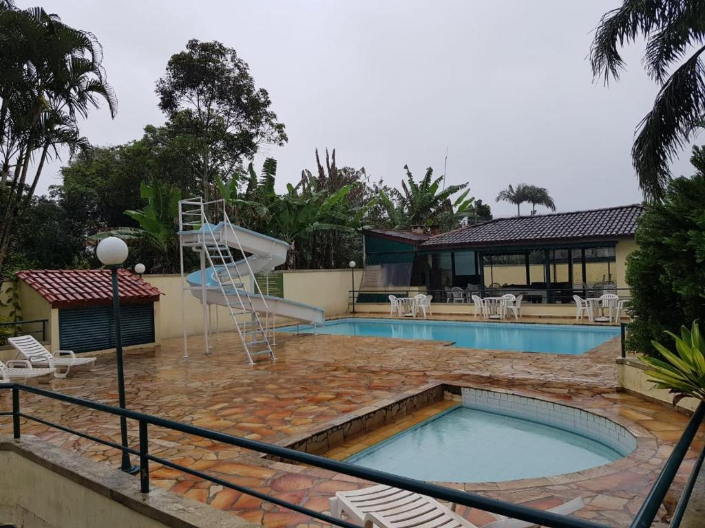 Πισίνα στο ή κοντά στο Condomínio Guaraciaba