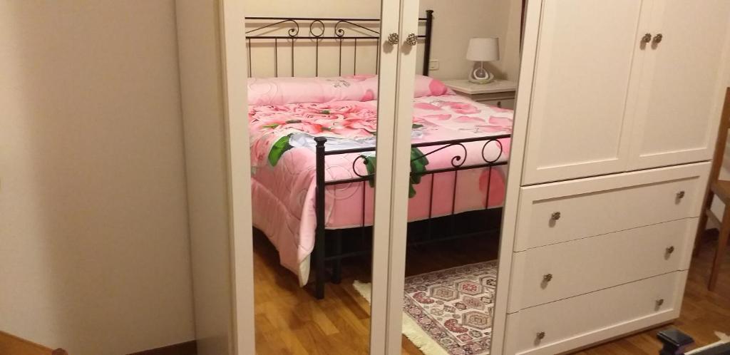 A bed or beds in a room at Casa Vacanze "Ai piedi di Assisi"