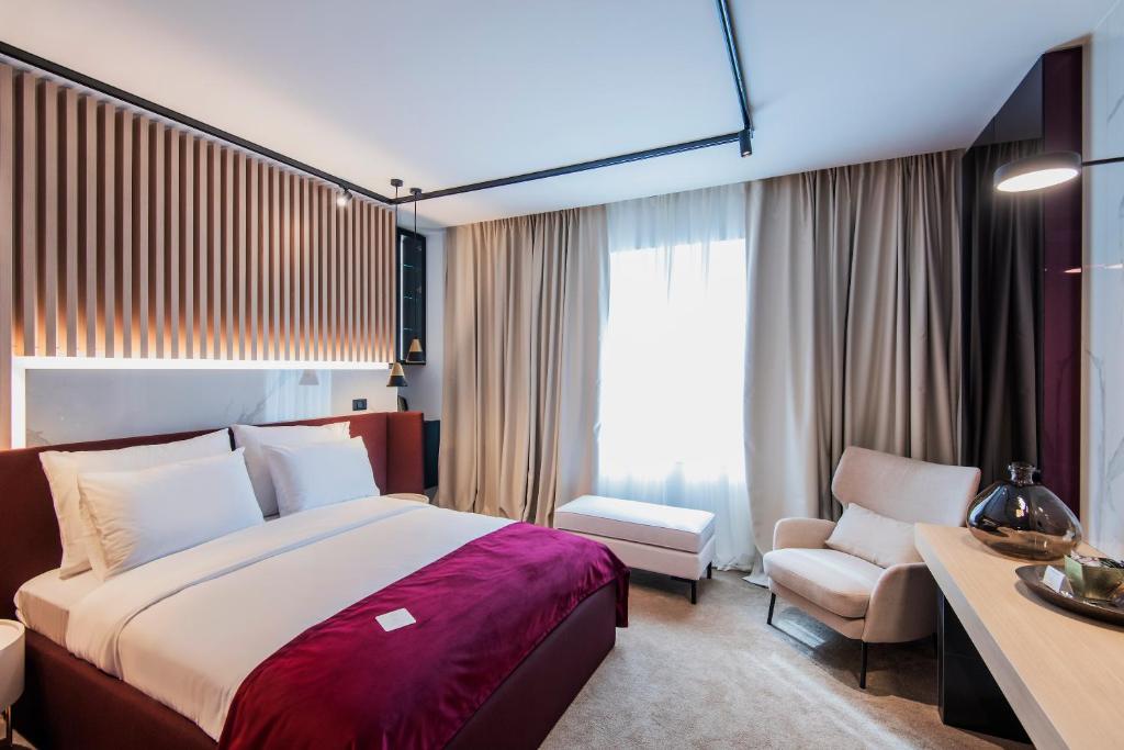 Posteľ alebo postele v izbe v ubytovaní Pod Zidom Rooms