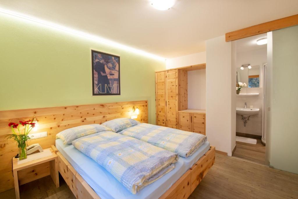 Postel nebo postele na pokoji v ubytování B & B Apartments Ortlerblick