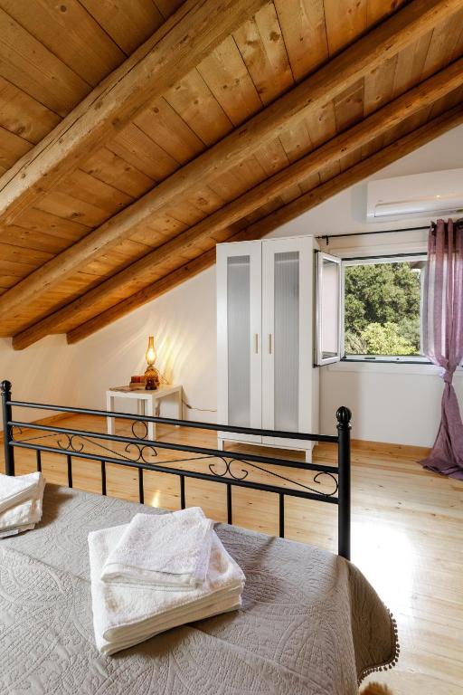 Łóżko lub łóżka w pokoju w obiekcie fridas place