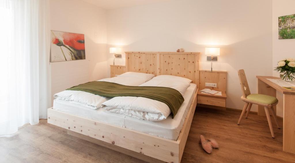 Postel nebo postele na pokoji v ubytování Garni Appartment Wagnerhof
