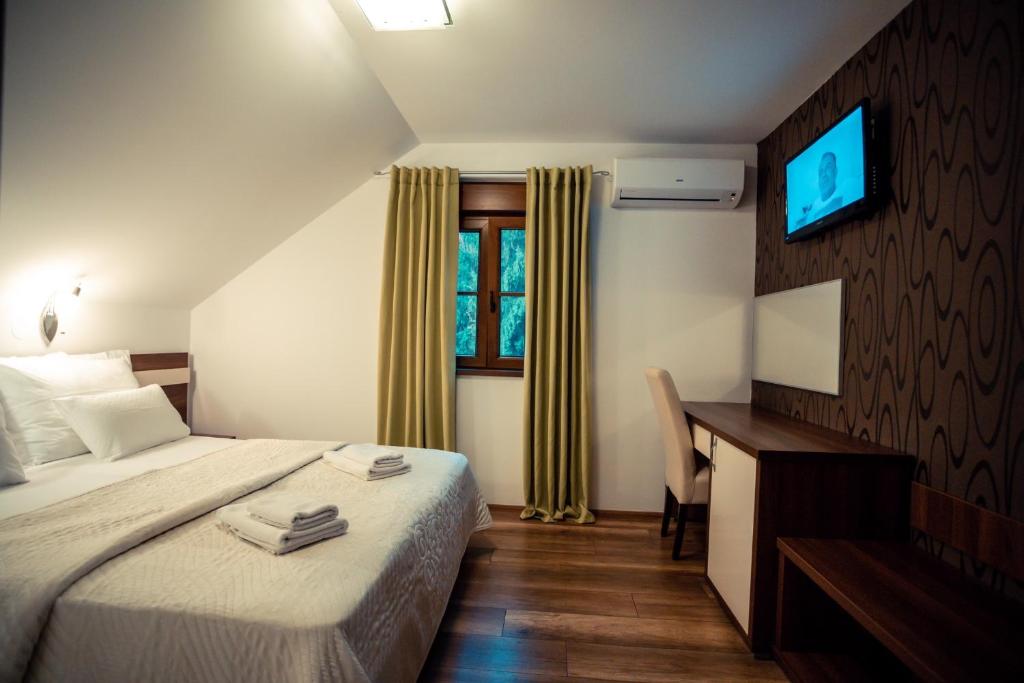 Posteľ alebo postele v izbe v ubytovaní Golden Lakes Rooms