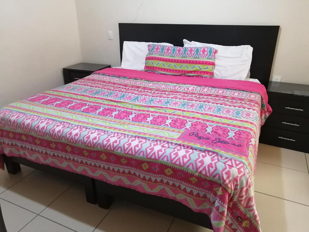 Postel nebo postele na pokoji v ubytování Hotel Peña Real