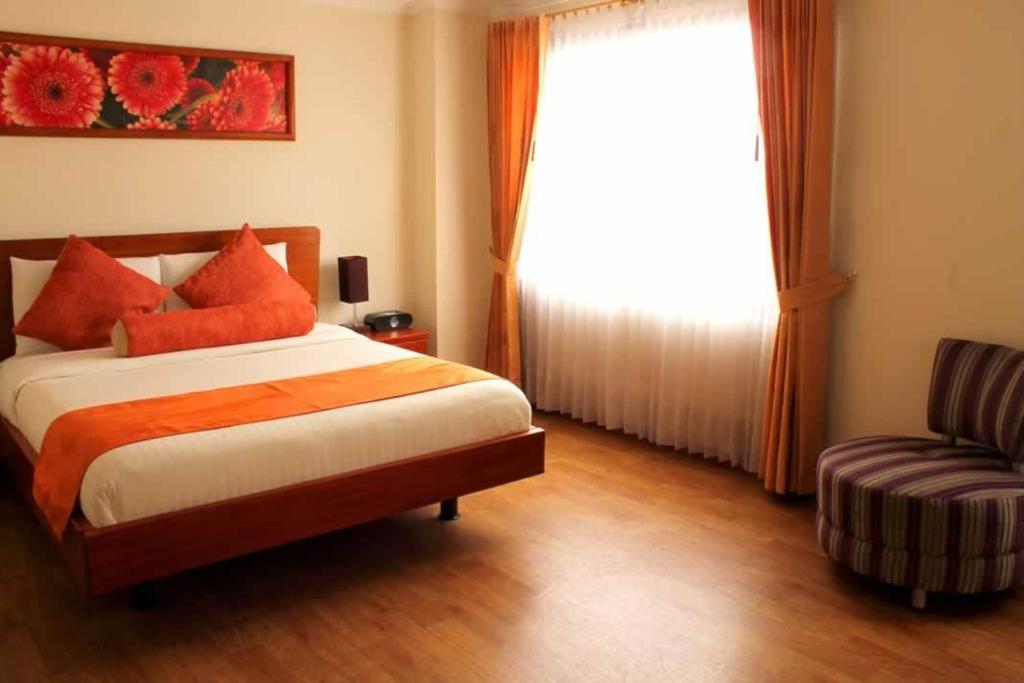 Postel nebo postele na pokoji v ubytování Hotel Splendor by Friends Company