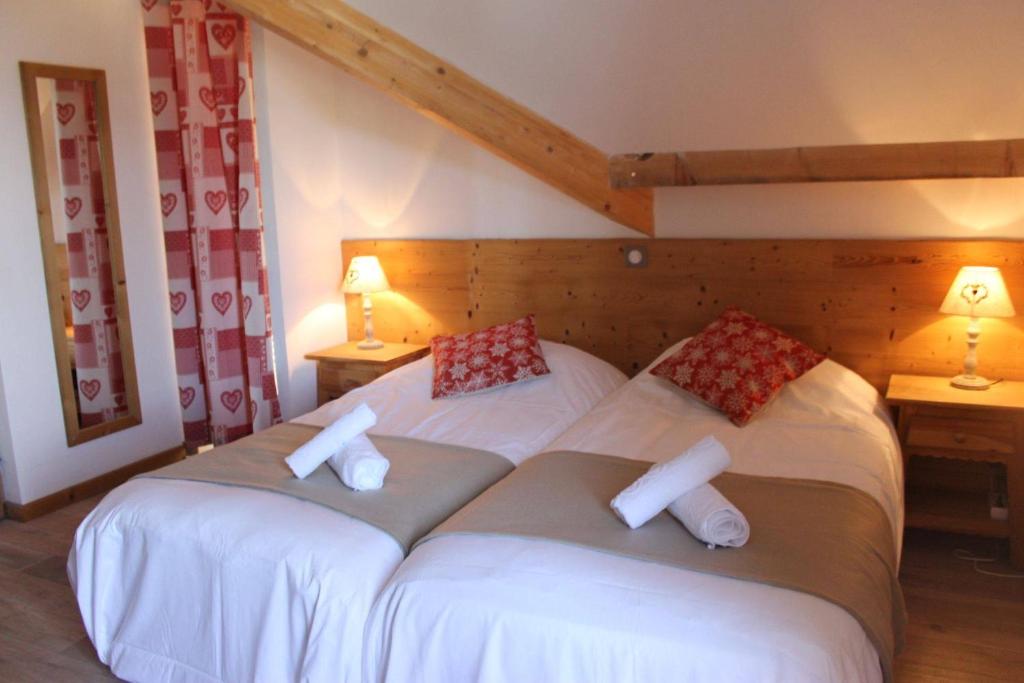 Katil atau katil-katil dalam bilik di Chalet Grande Etoile des Neiges