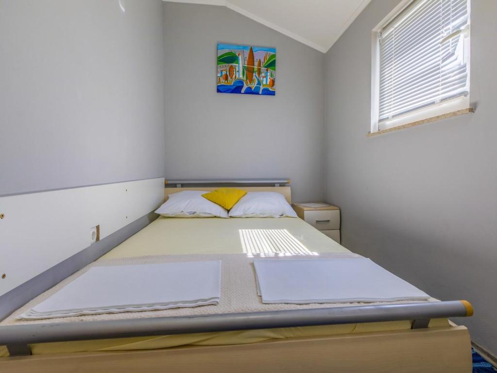 Postel nebo postele na pokoji v ubytování Apartment Heriban