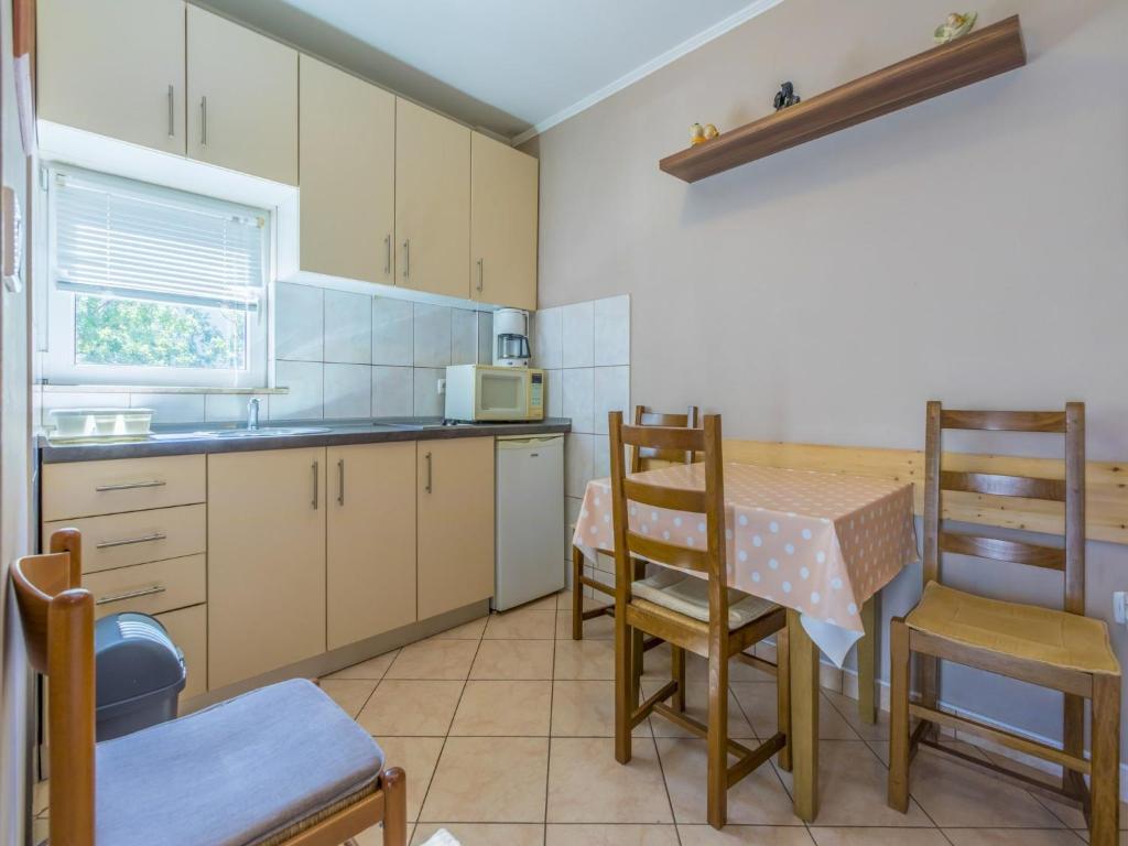 Kuchyň nebo kuchyňský kout v ubytování Apartment Heriban