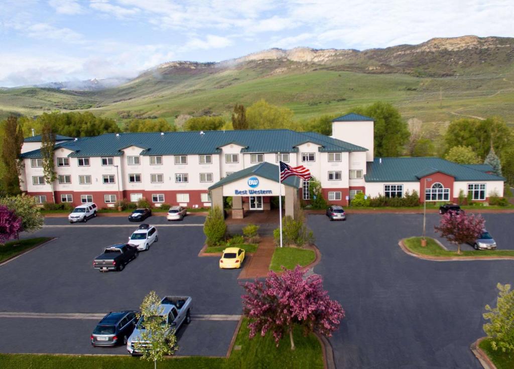 an aerial view of a hotel with a parking lot at Best Western Holiday Hills in Coalville