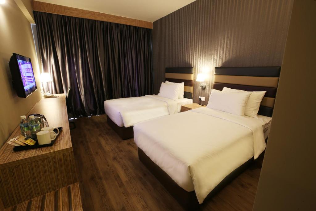 Postel nebo postele na pokoji v ubytování SEM9 Senai "Formerly Known As Perth Hotel"