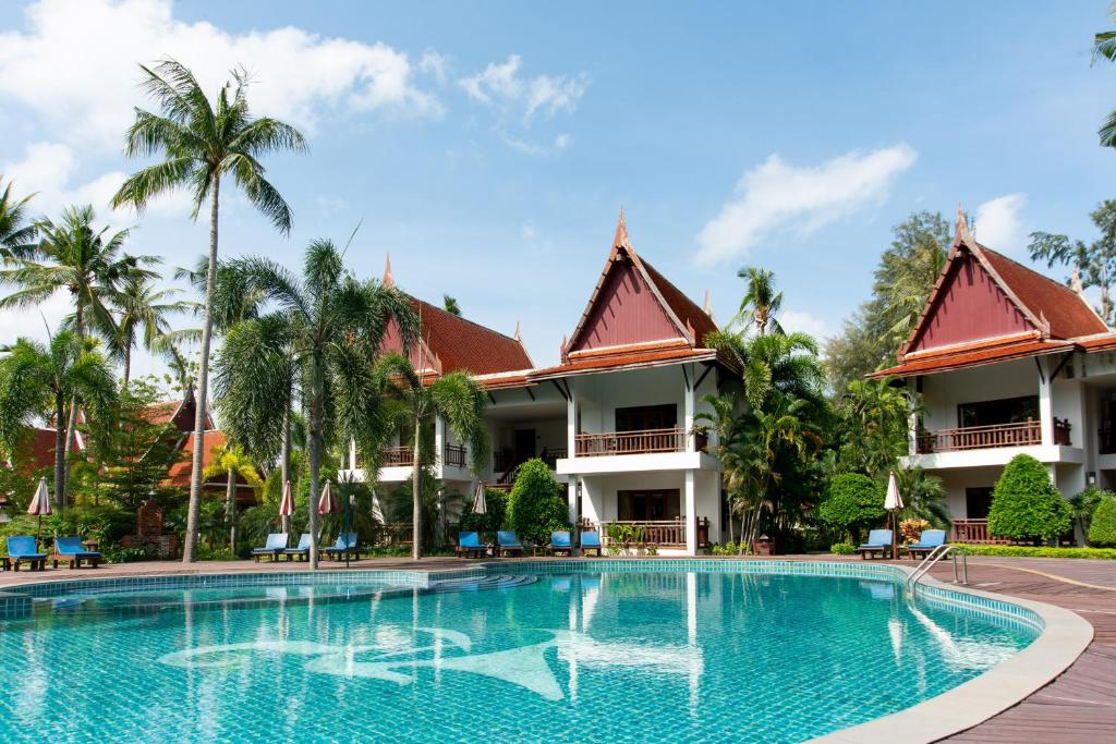 a swimming pool in front of a resort at Royal Lanta Resort & Spa in Ko Lanta