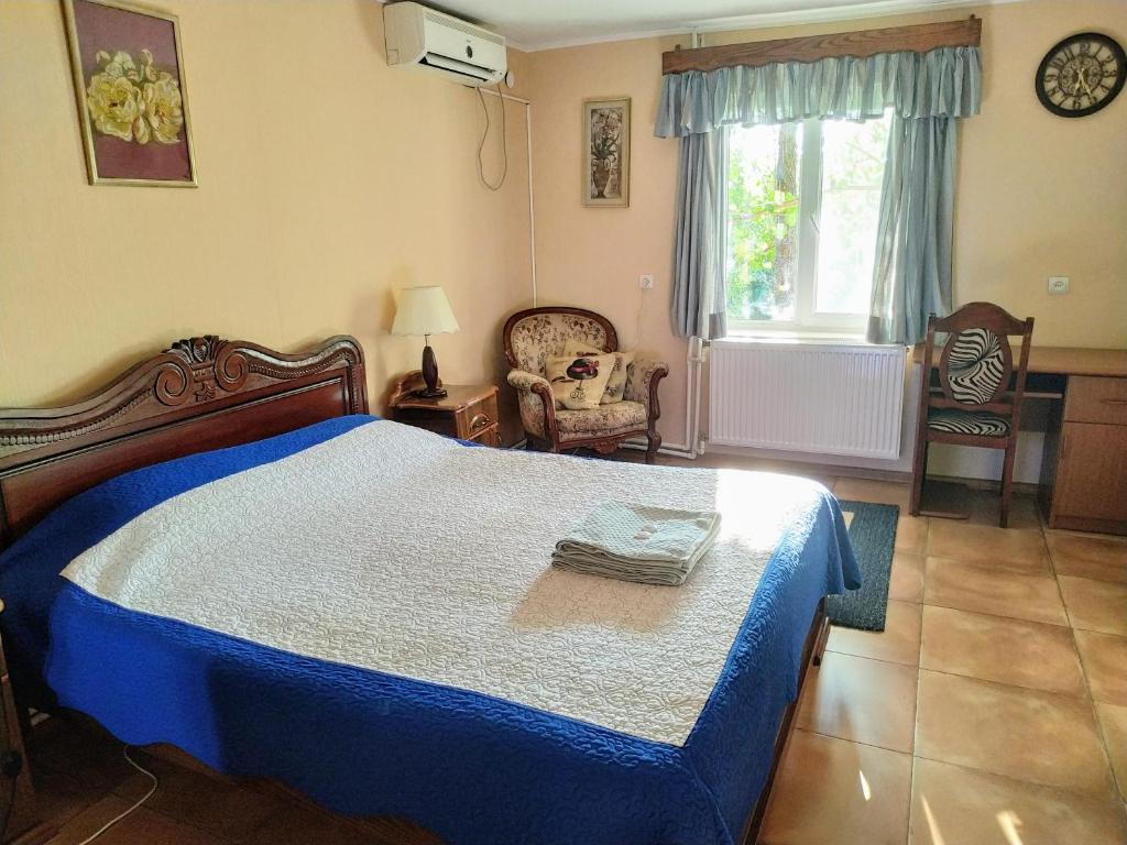A bed or beds in a room at Country House Uliana