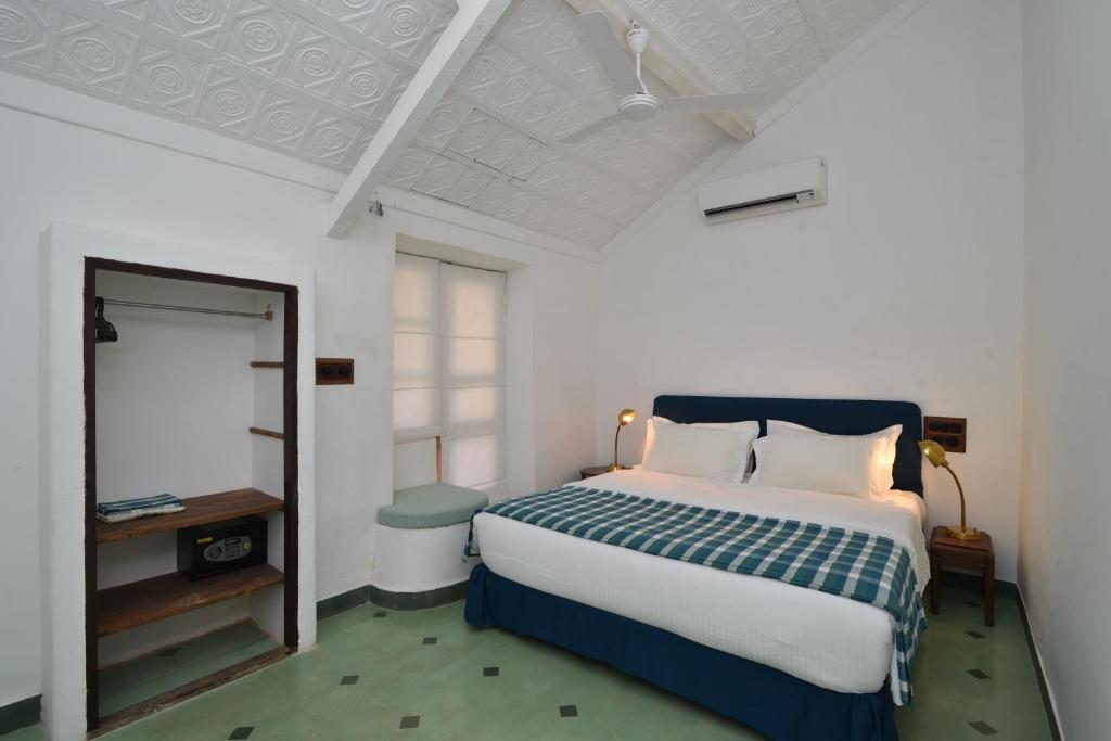 Postel nebo postele na pokoji v ubytování Mateus Boutique Hotel