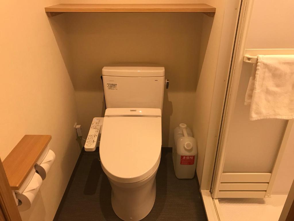 Koupelna v ubytování Dormy Inn Mito