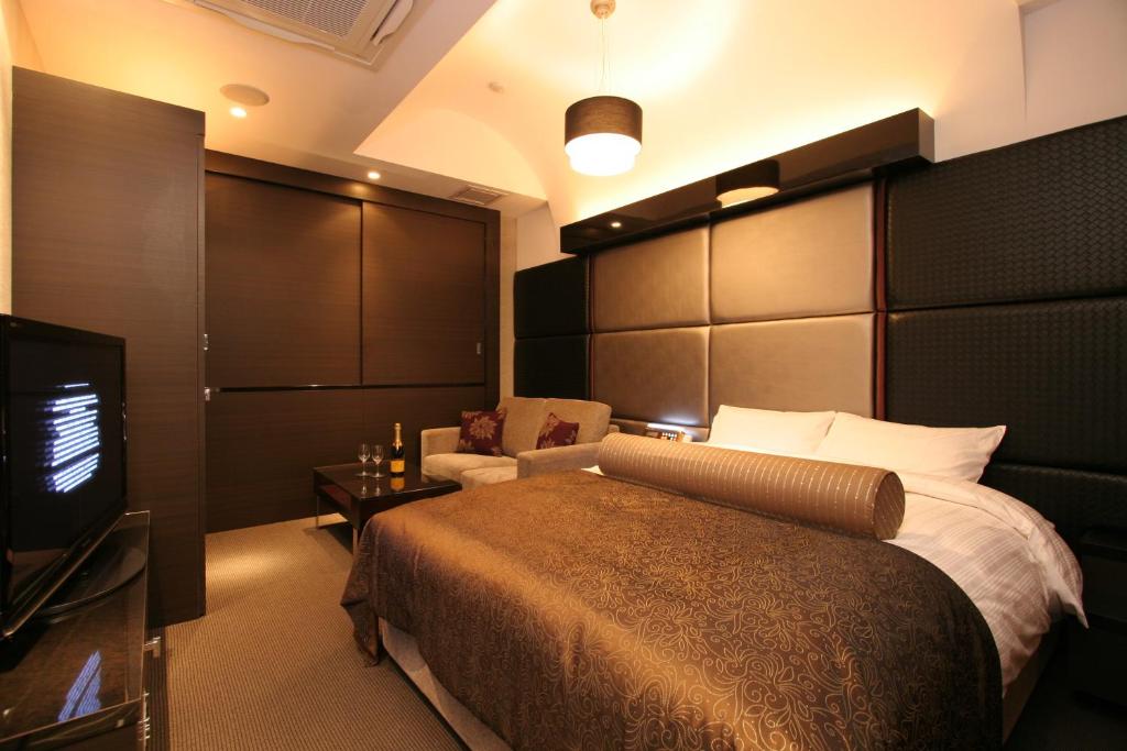 Postel nebo postele na pokoji v ubytování HOTEL W-PREMIUM -W GROUP HOTELS and RESORTS-