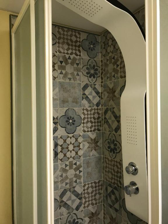 Koupelna v ubytování Domus La Foce Hotel