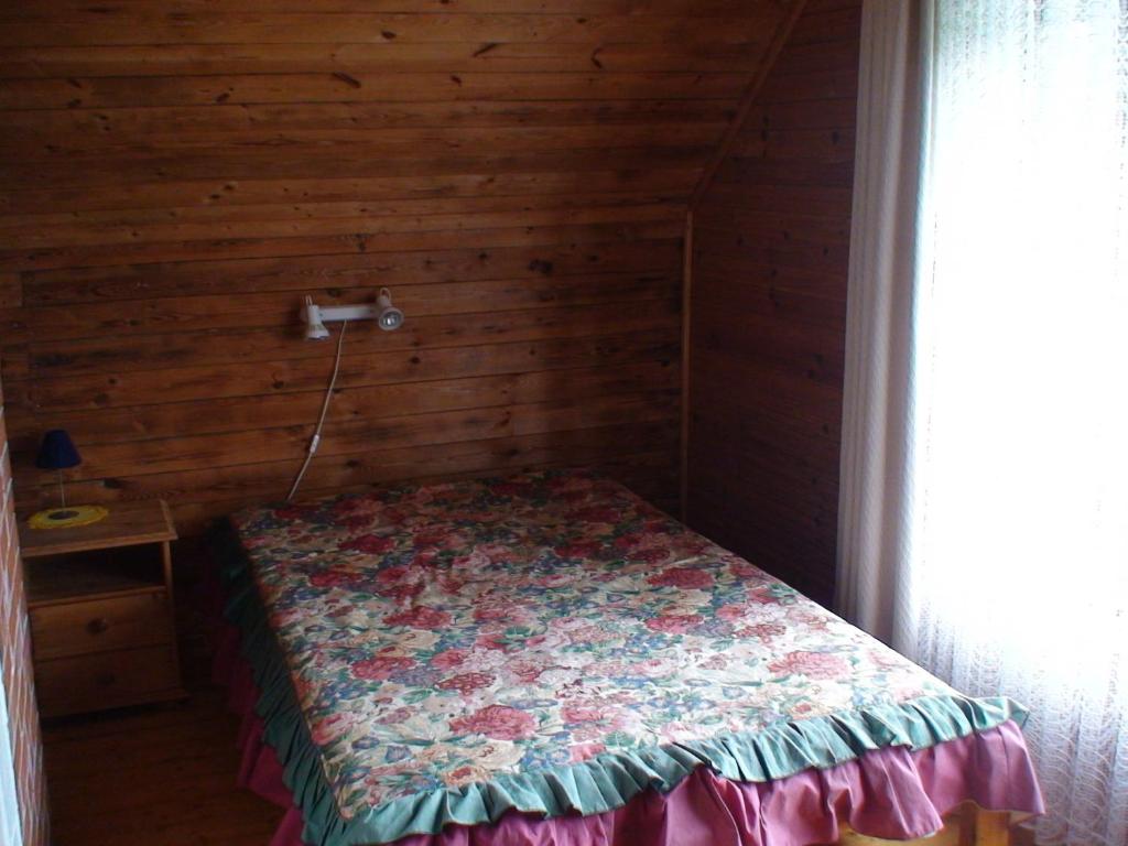 Postel nebo postele na pokoji v ubytování Mäe Farm