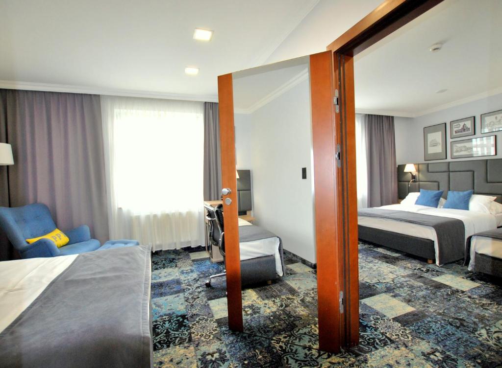 Posteľ alebo postele v izbe v ubytovaní Hotel Włoski Italia Boutique Old Town Poznań