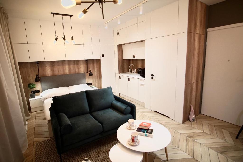 Kuchyňa alebo kuchynka v ubytovaní ONE Apartamenty Gąsiorowskich 4