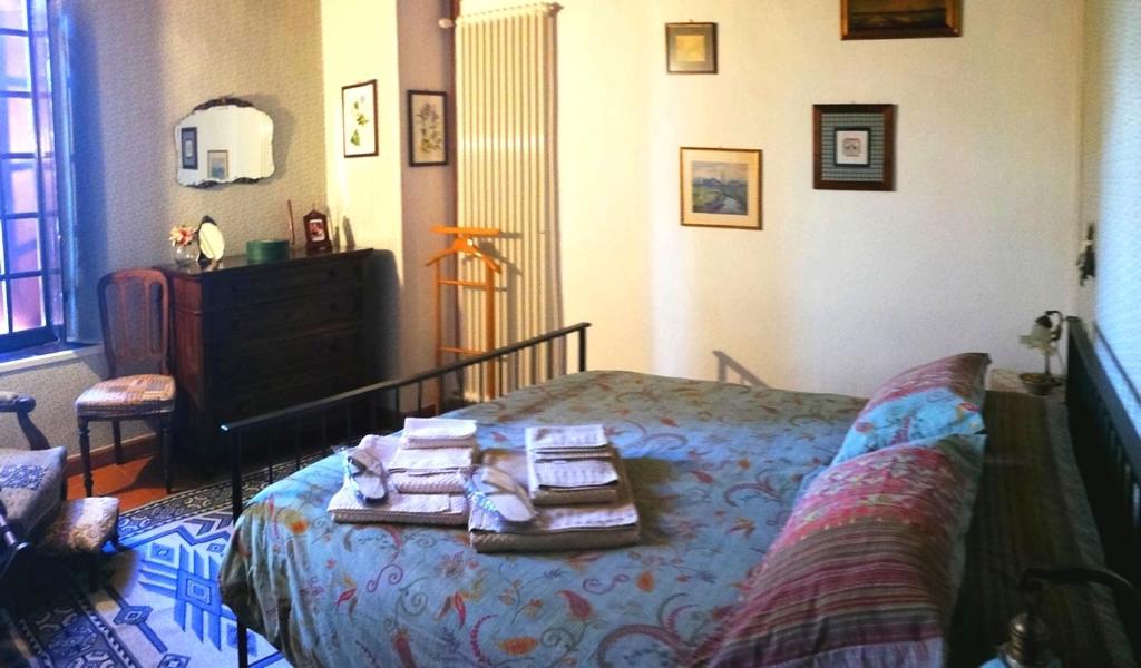 Кровать или кровати в номере Room & Breakfast Nel Borgo Scipione