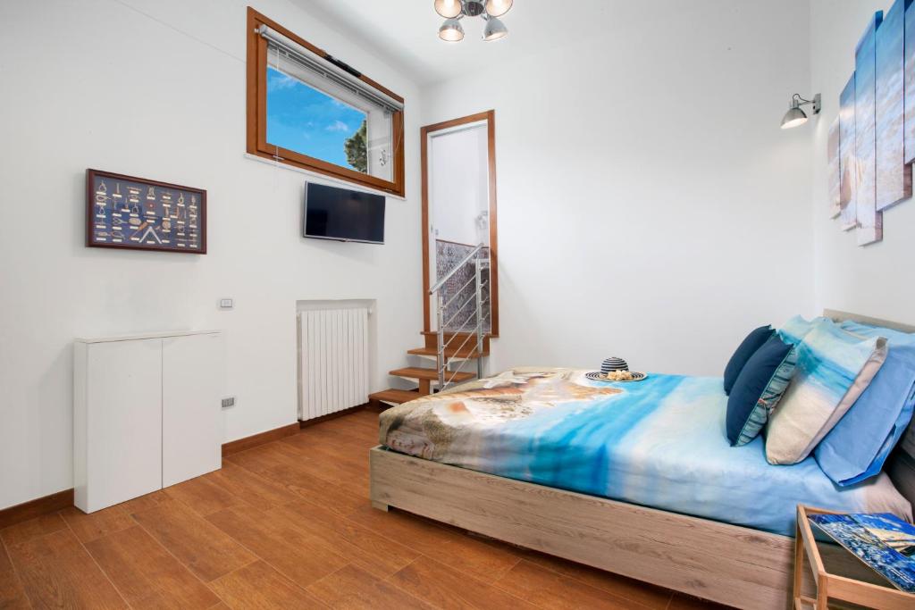 Postel nebo postele na pokoji v ubytování La Terrazza 38