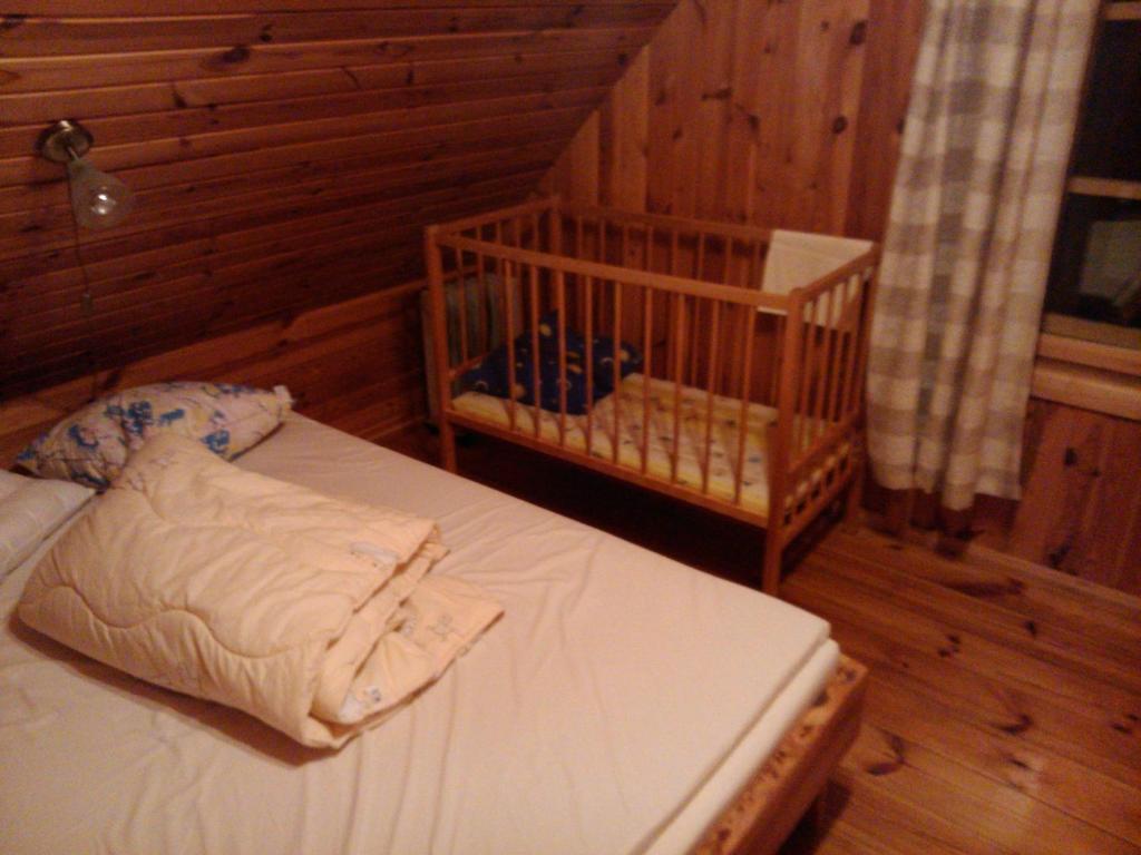 Postel nebo postele na pokoji v ubytování Hundi Holiday House