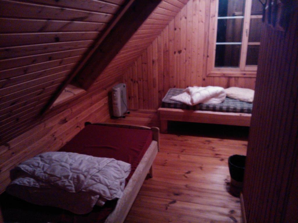 Postel nebo postele na pokoji v ubytování Hundi Holiday House