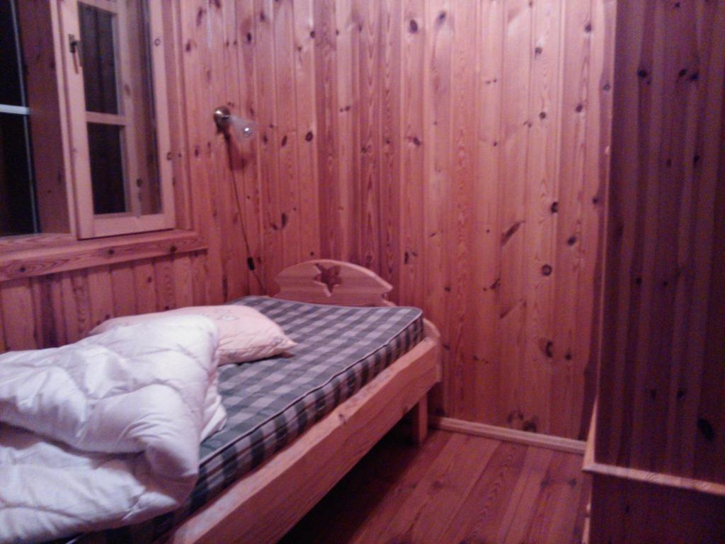 Postel nebo postele na pokoji v ubytování Hundi Holiday House