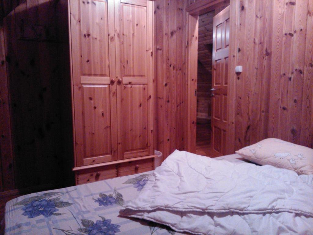 Postel nebo postele na pokoji v ubytování Hundi Holiday House