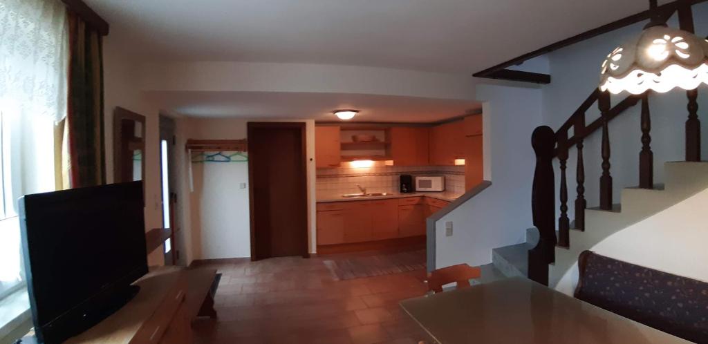 Kuchyň nebo kuchyňský kout v ubytování Appartements Königshofer