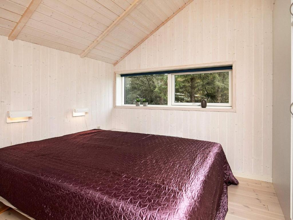 Postel nebo postele na pokoji v ubytování 6 person holiday home in Thisted