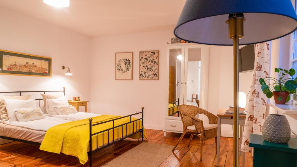 Postel nebo postele na pokoji v ubytování Cocorico Apartments