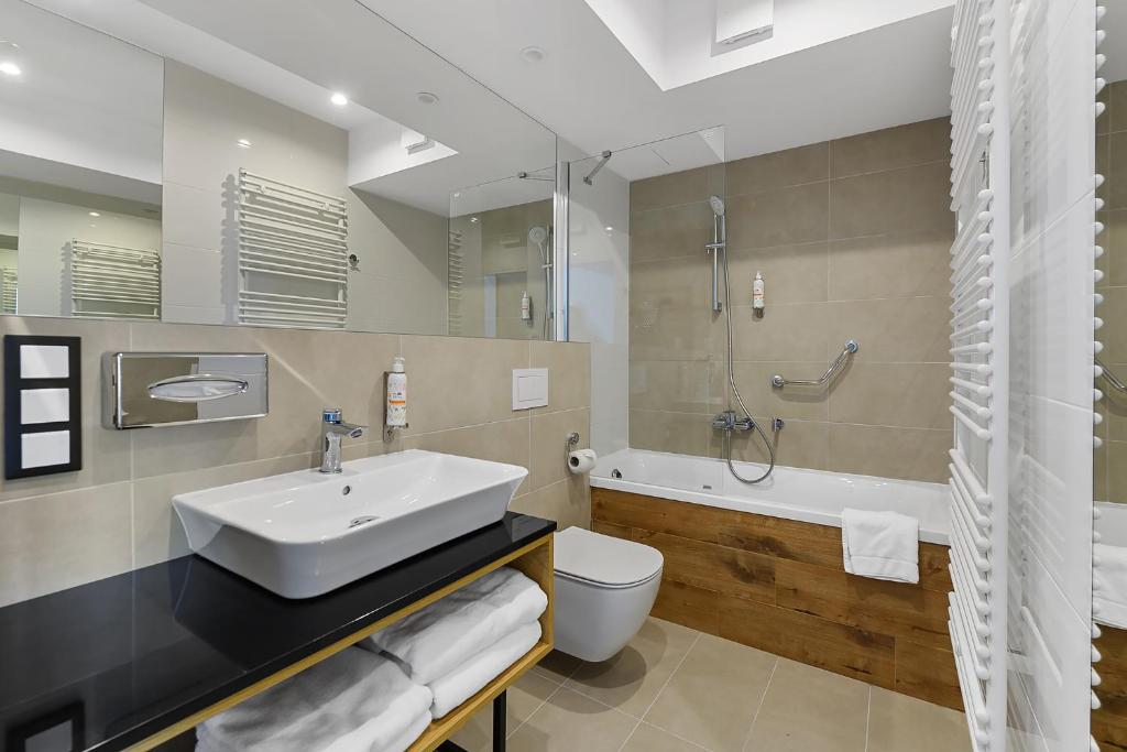 Koupelna v ubytování Aparthotel Termy Uniejów