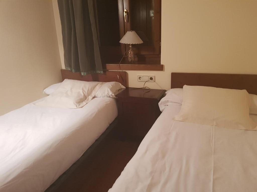 Postel nebo postele na pokoji v ubytování Apartamento salardu