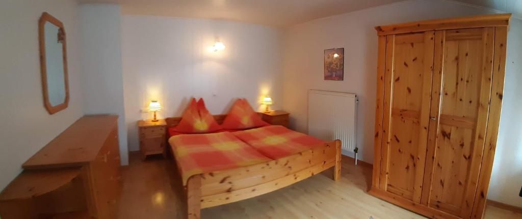 Postel nebo postele na pokoji v ubytování Appartements Königshofer