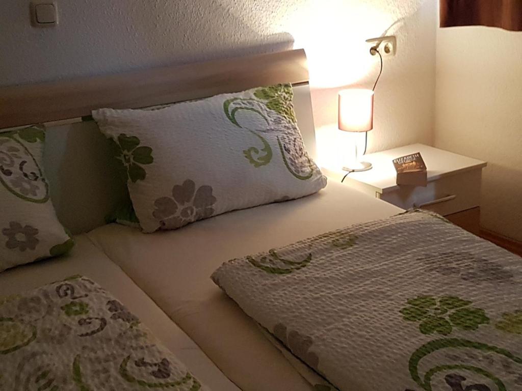 Postel nebo postele na pokoji v ubytování Das Altstadthaus