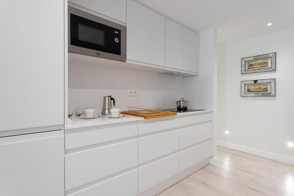 A kitchen or kitchenette at Genteel Home Cabildo