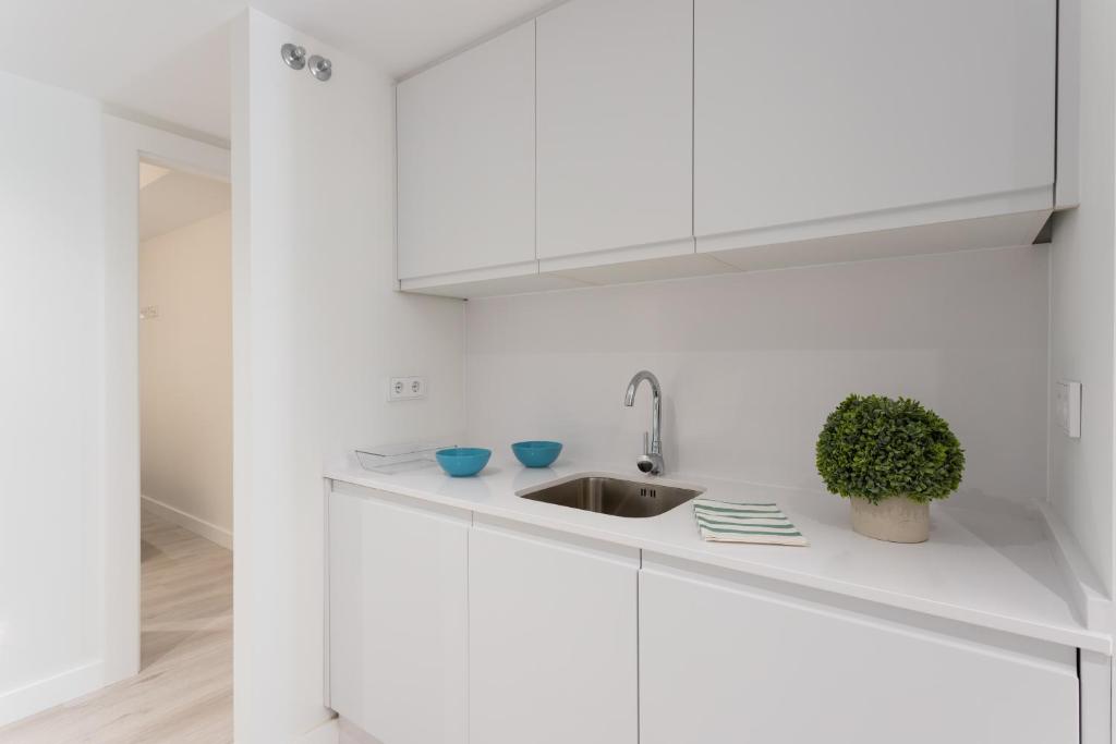A kitchen or kitchenette at Genteel Home Cabildo