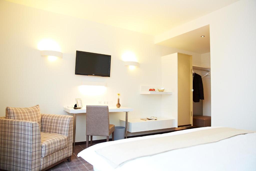 TV a/nebo společenská místnost v ubytování Landhotel Sonne