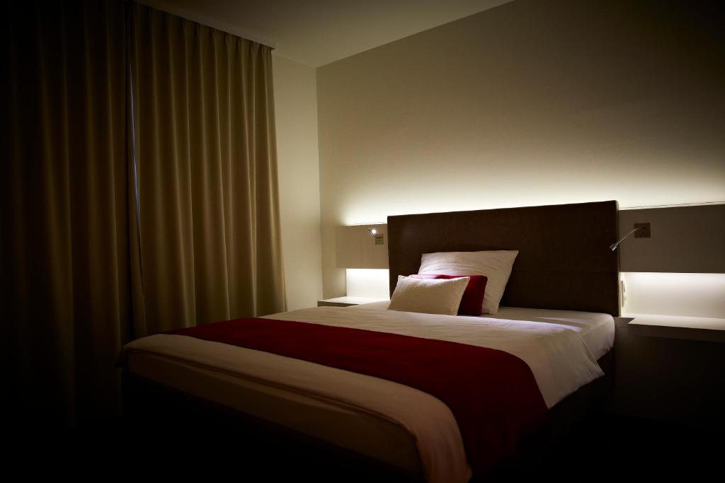 Postel nebo postele na pokoji v ubytování Landhotel Sonne