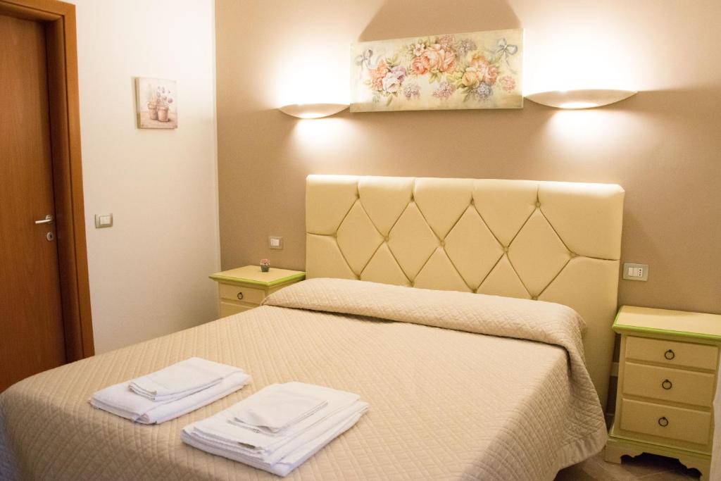 En eller flere senger på et rom på Residence Bellaria