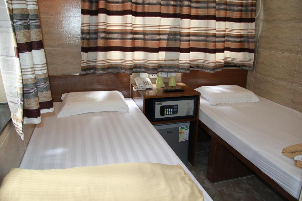 Rúm í herbergi á Russian Hostel